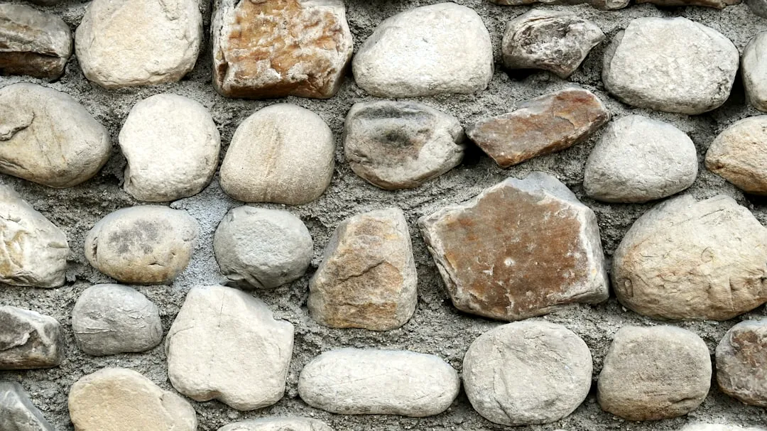 A close up of a stone wall made of rocks