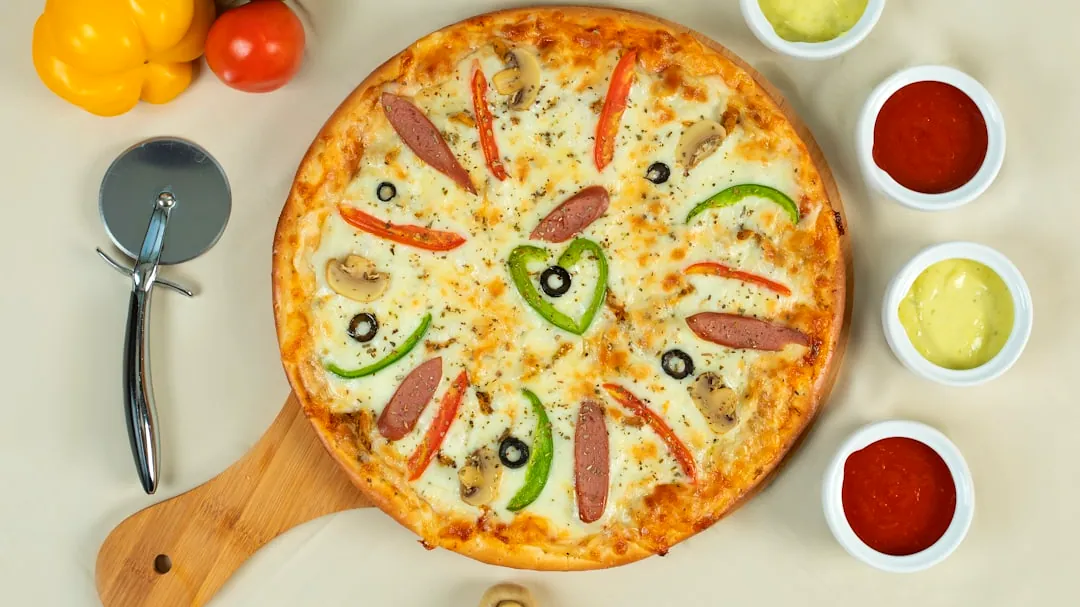 pizza with tomato and green chili