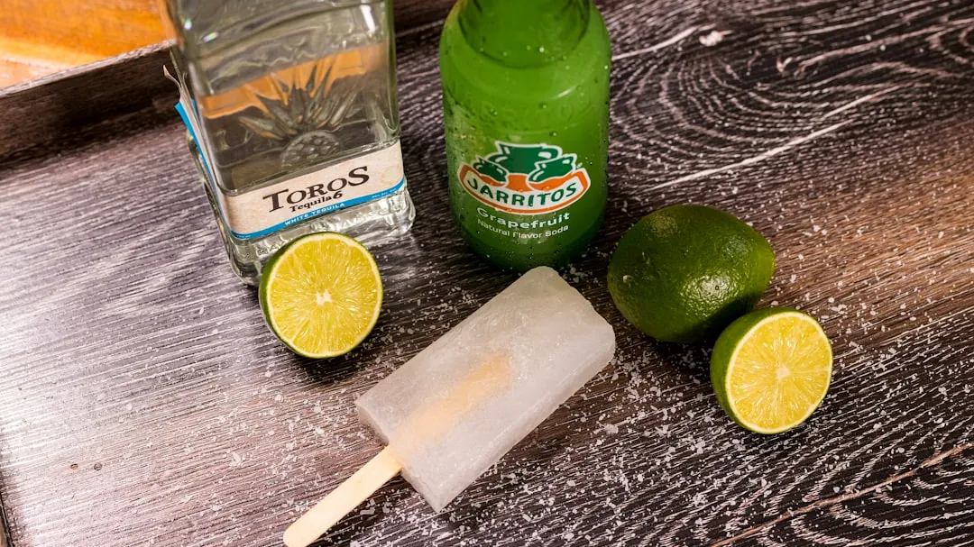 sprite plastic bottle beside ice cube